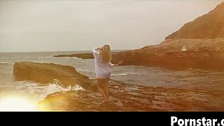 Blonde teen Scarlet Red strips and fingers shaved pussy on bed 😍