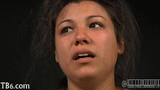 Hung Up Hottie Endures Rough Punishment in Garage