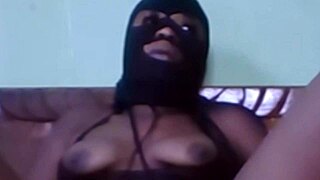 Cyndy blackslave indulges in webcam masturbation under her master's command.