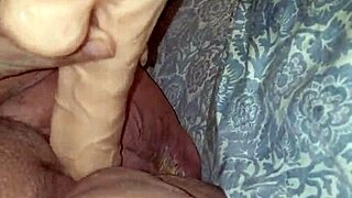 A submissive woman is spanked hard in a BDSM lezdom session with bondage and choking.