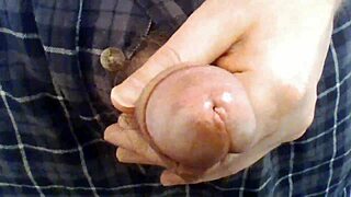 guy playing with his open fly penis and precum
