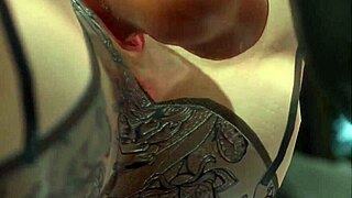 Sexy redhead chick lounges on the sofa