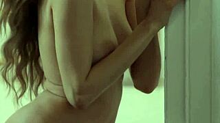 Ilvy Kokomo poses on her bed