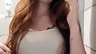 redhead fetish enthusiast lights up a cigarette in a smoky session