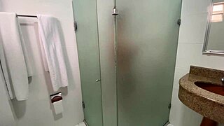 shared bathroom in the dorm, redhead with natural tits giving a handjob