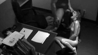 Blonde secretary assists boss at work with handjob