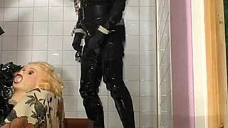 In this retro blue film, Roxina interacts with her turbo doll in a toilet setting, captured in XXL WMV format for detailed viewing.