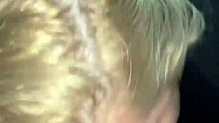 A couple enjoys a private homemade moment with passionate intimacy in their bedroom.