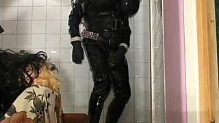 In this retro blue film, Roxina interacts with her turbo doll in a toilet setting, captured in XXL WMV format for detailed viewing.