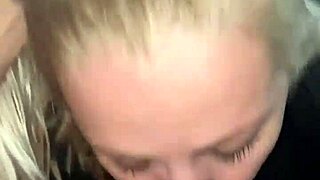 A couple enjoys a private homemade moment with passionate intimacy in their bedroom.