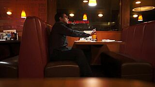 Indian Guy Enjoys American Breakfast in Public Outdoor Setting