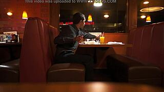 Indian Guy Enjoys American Breakfast in Public Outdoor Setting