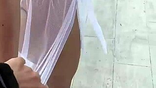 Naughty crossdressing slut flashes on beach