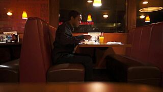 Indian Guy Enjoys American Breakfast in Public Outdoor Setting