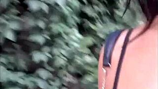 Brazilian girl fingers herself to orgasm in public park.