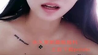 I watch this Asian amateur girl perform a strip show.