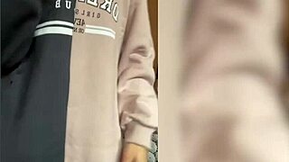 In the kitchen, the skinny college girl fingers her pussy.