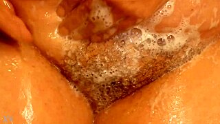 i spyed on my wife in the shower n got caugt with her shaved tits