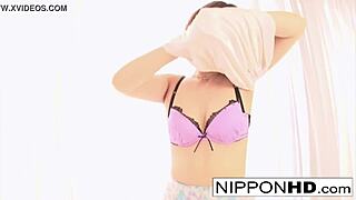 Watch this Asian hottie tease the camera with her cock sucking skills