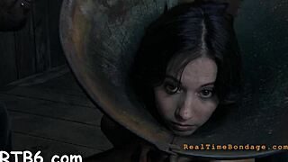 Is The Restrained Cutie Getting Punished In The Garage?