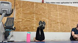 Asian Woman In Black Leggings At Gym