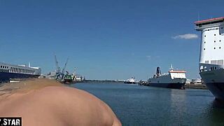 German blonde couple enjoys outdoor time in Rotterdam harbor