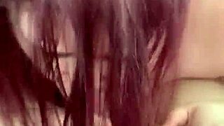 Chubby white girl gives long blowjob to fat guy in detailed action.