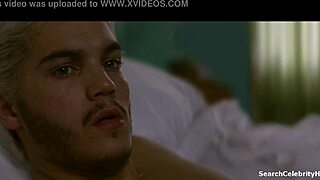 Busty Olivia Wild gives a handjob in Alpha 2006