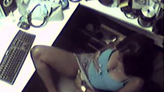 Ebony babe toying her pussy solo in the office