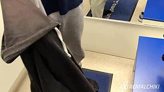 hot sporty twink gets handjob in public fitting room