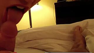 Blonde bombshell gives a POV blowjob and footjob in a steamy scene