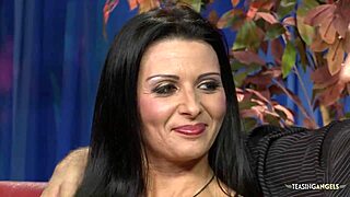 Two girls moan while fucking on couch