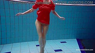 Cute babe swimming in red sexy open dress 😍