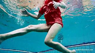 Cute babe swimming in red sexy open dress 😍