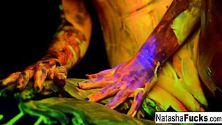 Busty natasha nice shoots a fun and sexy black light video nude solo.