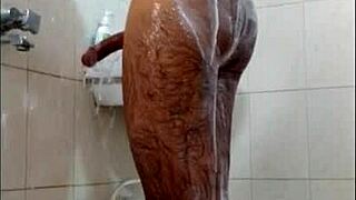 dude jerks off in the shower and shoots his load