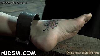 Brunette babe masturbates with toys in bdsm slave scene