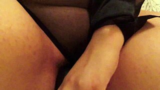 Latina in lingerie masturbating with dildo and fingers