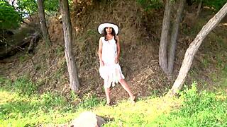 hey, wanna see this naughty brunette strip nude by the river in her cute dress?