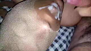 Masked man sucks cock in nylon leggings!