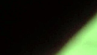 the girl moaned loudly as the big black cock pounded her ass in the dark room, stretching her wide with its monster size