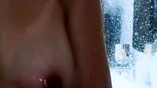 the cute asian girl bathes in the shower.