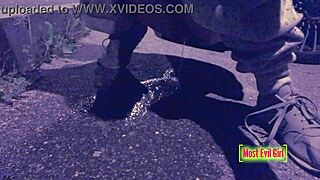 girl alone at night in parking lot lowers pants to piss