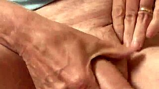 Mature gay man ties his cock and balls. The bdsm session builds intense pleasure.