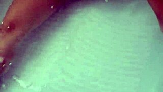 sexy pornstar enjoys masturbation in hydro massage bathtub focusing on boobs and cock details