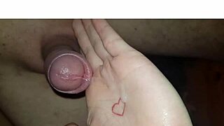 The blonde milf wife collects cum after licking and swallowing in homemade handjob.