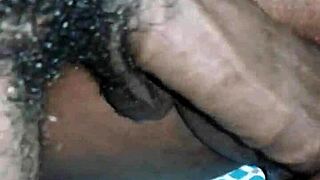 This ebony mature amateur gets her big ass pussy wet with a big black cock in anal action.