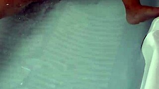 sexy pornstar enjoys masturbation in hydro massage bathtub focusing on boobs and cock details