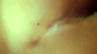 young woman masturbates alone in her comfortable bed