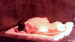 her tits bounce in the jacuzzi as she rides my cock moaning